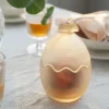 HADELAND GLASSVERK AS Påskepynt-GLASSEGG HARE MED LOKK FROSTET GUL